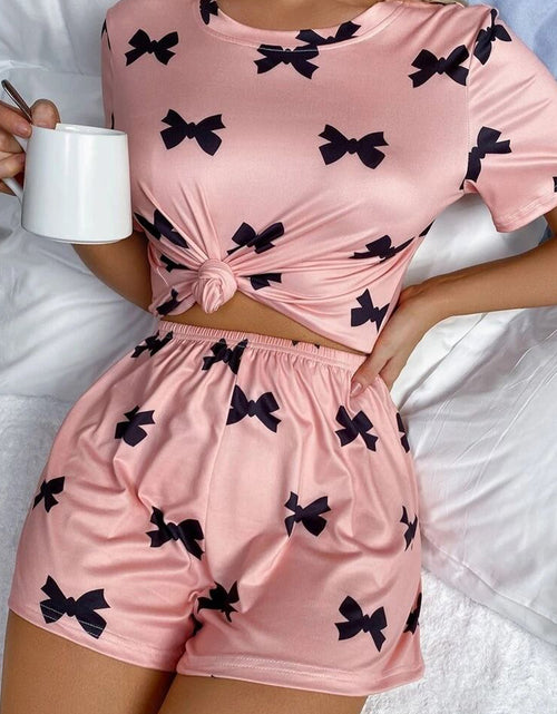 Load image into Gallery viewer, Pink Allover Bow Print Pockets Cropped Pajama Set
