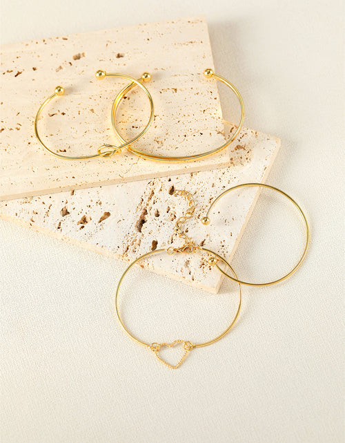 Bild in Galerie-Viewer laden, Gold Heart Geometric Knot Open Cuff Bracelet 4-piece Set
