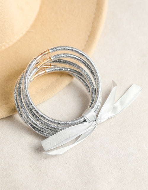 Load image into Gallery viewer, Apricot Glitter Bowknot Layered Jelly Bracelet
