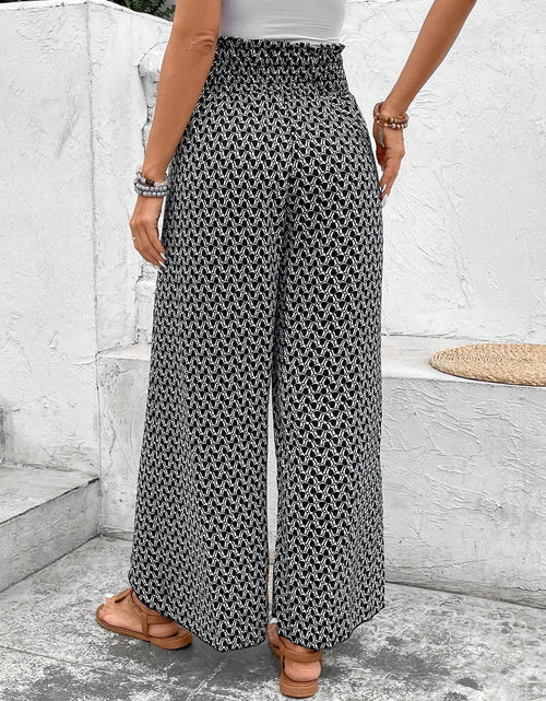 Load image into Gallery viewer, Pink Floral Shirred Side Slit Wide Leg Pants
