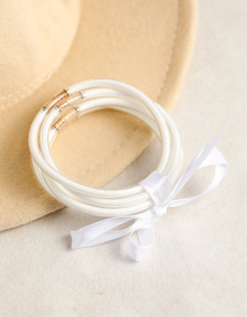 Load image into Gallery viewer, Apricot Glitter Bowknot Layered Jelly Bracelet
