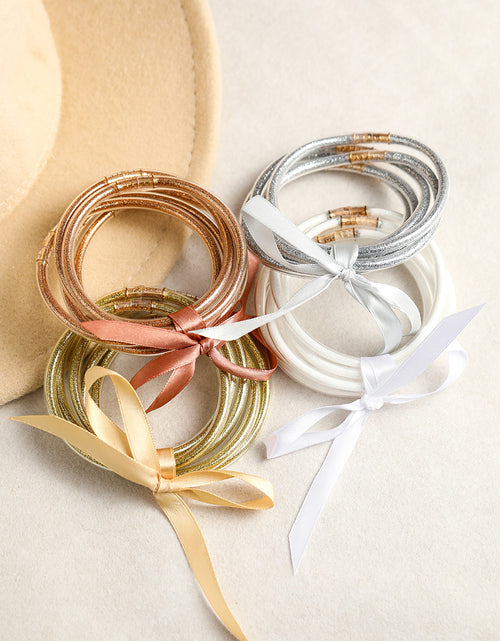 Load image into Gallery viewer, Apricot Glitter Bowknot Layered Jelly Bracelet
