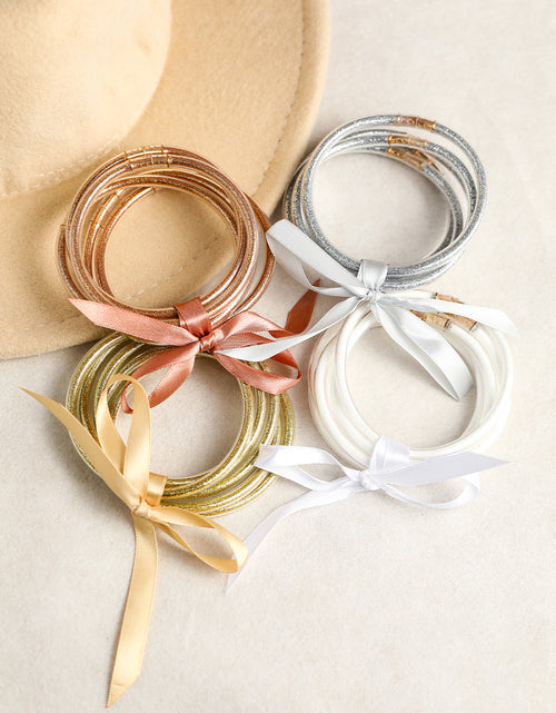 Load image into Gallery viewer, Apricot Glitter Bowknot Layered Jelly Bracelet
