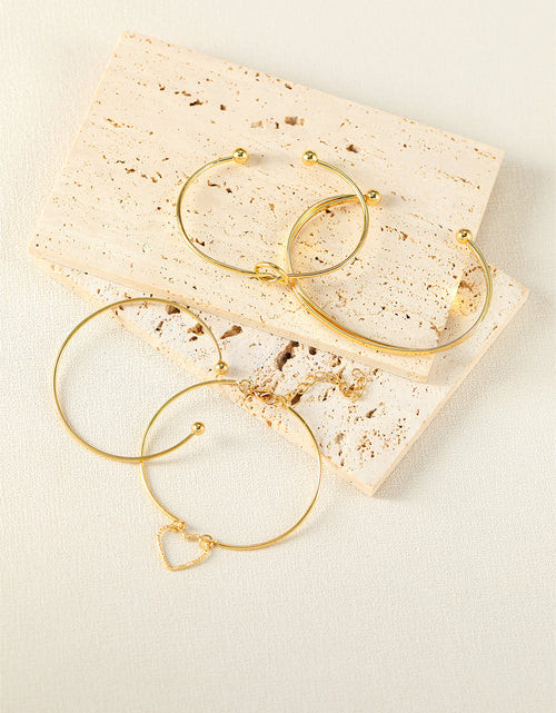 Bild in Galerie-Viewer laden, Gold Heart Geometric Knot Open Cuff Bracelet 4-piece Set
