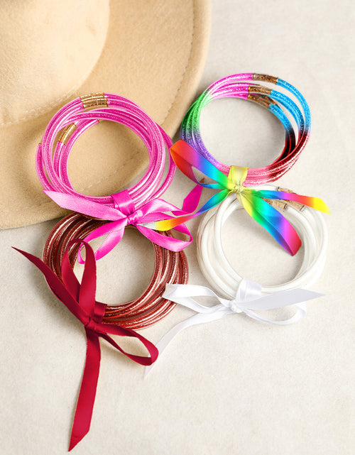 Load image into Gallery viewer, Apricot Glitter Bowknot Layered Jelly Bracelet
