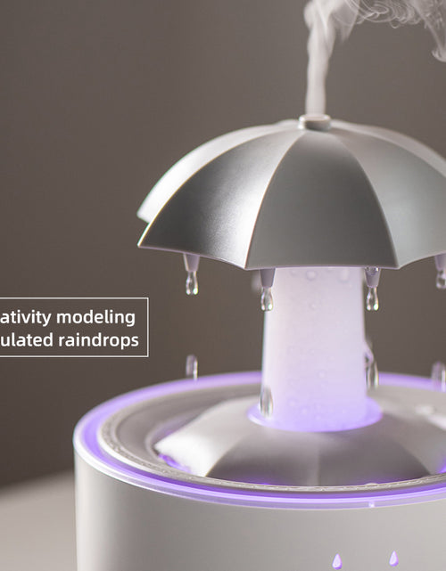 Load image into Gallery viewer, Rotating umbrella water droplet humidifier household heavy fog desktop rainbow lights remote control aromatherapy machine
