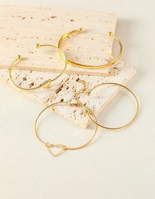 Bild in Galerie-Viewer laden, Gold Heart Geometric Knot Open Cuff Bracelet 4-piece Set
