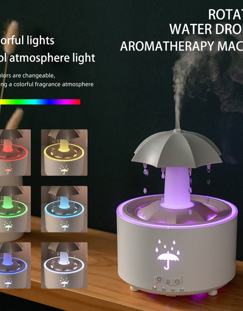 Load image into Gallery viewer, Rotating umbrella water droplet humidifier household heavy fog desktop rainbow lights remote control aromatherapy machine
