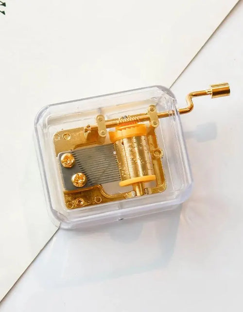 Load image into Gallery viewer, 1pc Mini Creative Acrylic Material Transparent Hand Windup Metal Movement Octave Box Music Box, Friend Couple Birthday Gift
