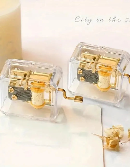 Load image into Gallery viewer, 1pc Mini Creative Acrylic Material Transparent Hand Windup Metal Movement Octave Box Music Box, Friend Couple Birthday Gift
