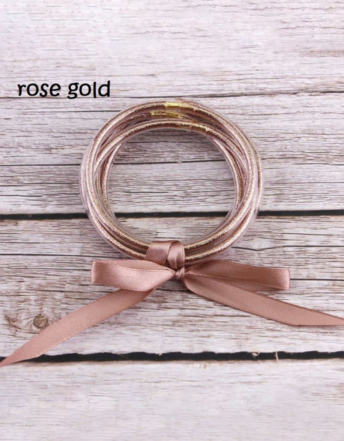 Load image into Gallery viewer, Apricot Glitter Bowknot Layered Jelly Bracelet
