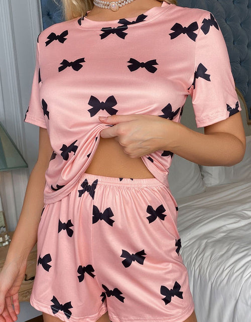 Load image into Gallery viewer, Pink Allover Bow Print Pockets Cropped Pajama Set
