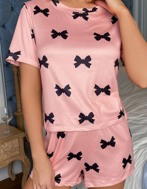 Load image into Gallery viewer, Pink Allover Bow Print Pockets Cropped Pajama Set
