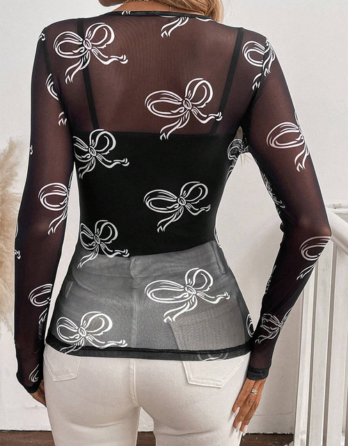 Load image into Gallery viewer, Black Bow Print Long Sleeve Mesh Top
