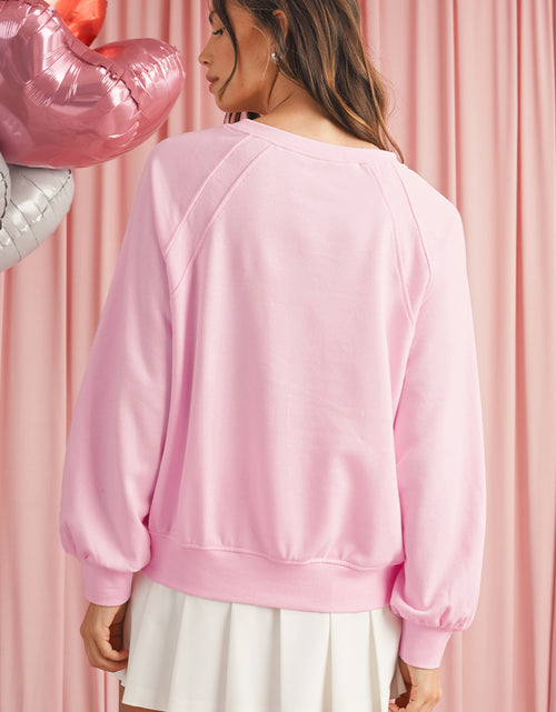 Bild in Galerie-Viewer laden, Pink Tinsel Hugs and Kisses Raglan Sleeve Sweatshirt
