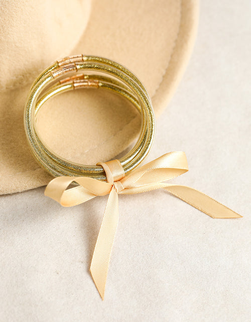Load image into Gallery viewer, Apricot Glitter Bowknot Layered Jelly Bracelet
